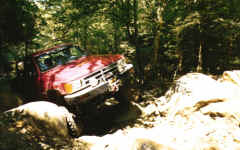Hal Hall walks his live axle 4-Runner up the rocks on Trail 5